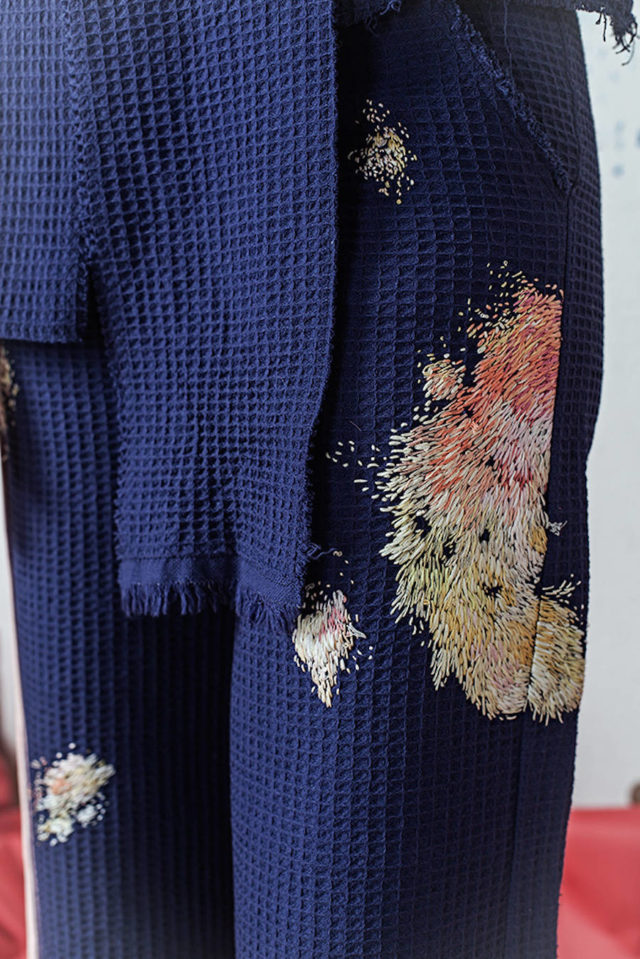 paint splotch embroidered clothing by olya glagoleva and lisa smirnova blue pants detail