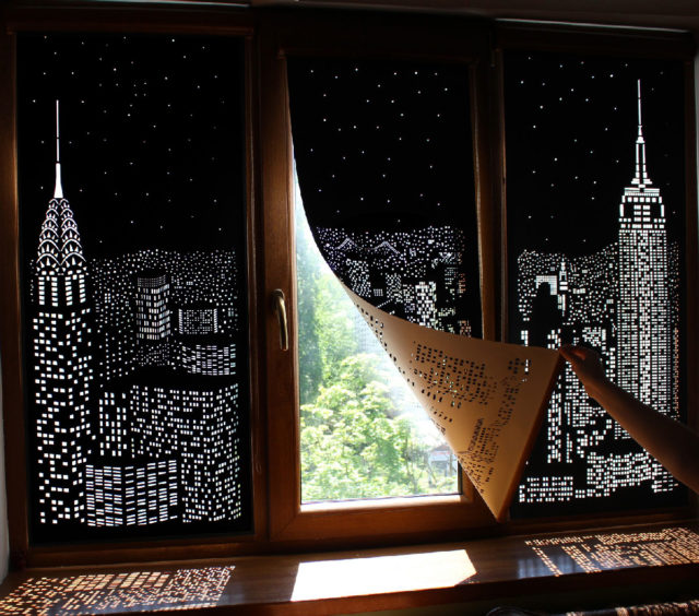 Cityscape blinds - Holeroll blinds open window