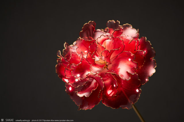 Kanzashi or Japanese hair combs red carnation