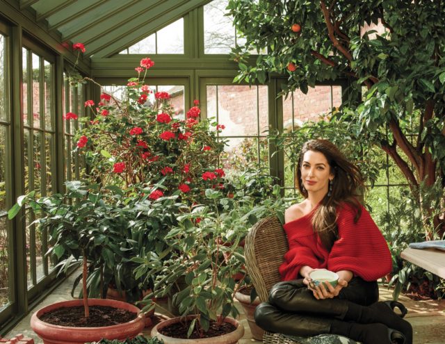 Amal Clooney BY Annie Leibovitz for Vogue May 2018 - in Oscar de la Renta sweater in greenhouse