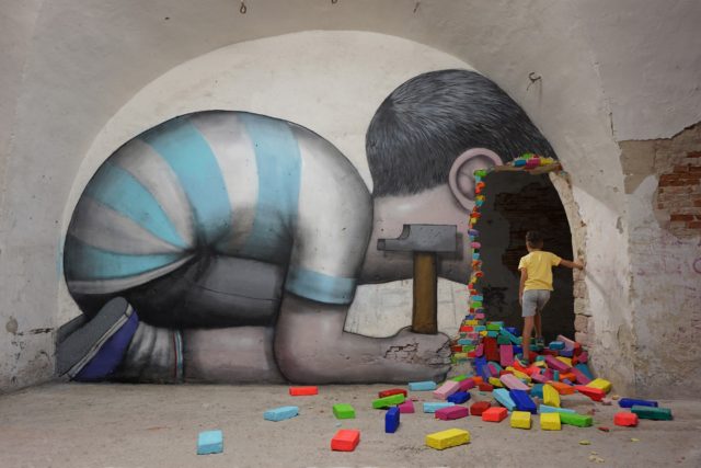 French Street art museum - boy kneeling