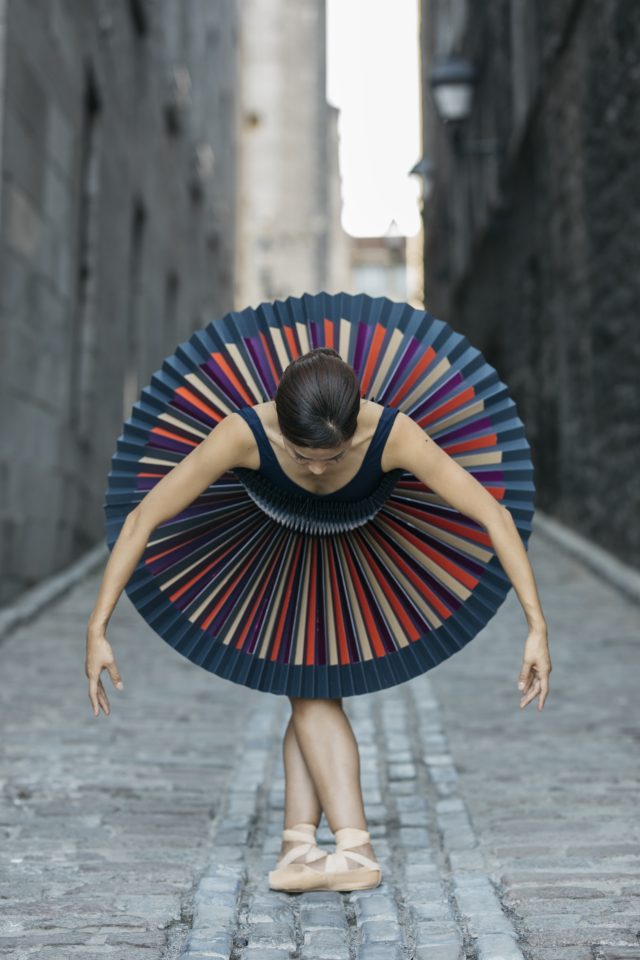 Origami dancers by Melika Dez - multicolor in alley
