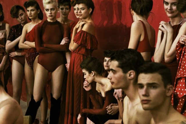 Crystal Renn for Vogue Portugal September 2018 - group in red outfits