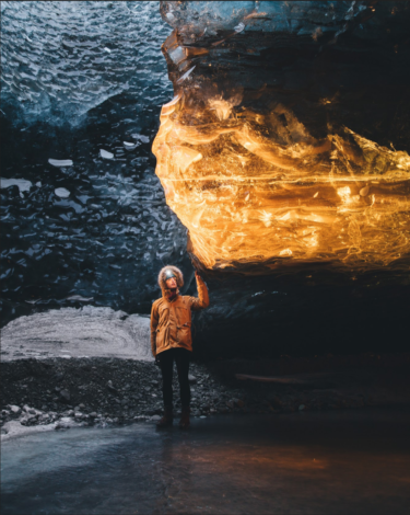 Winter in an Icelandic cave - gold and black glow