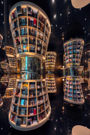 Zhongshuge mirrored book stores - rounded displays