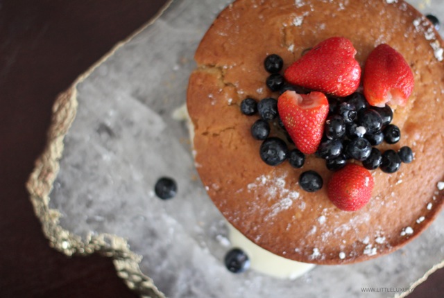 Buttermilk cake with marscapone cream and wine berries top by little luxury list