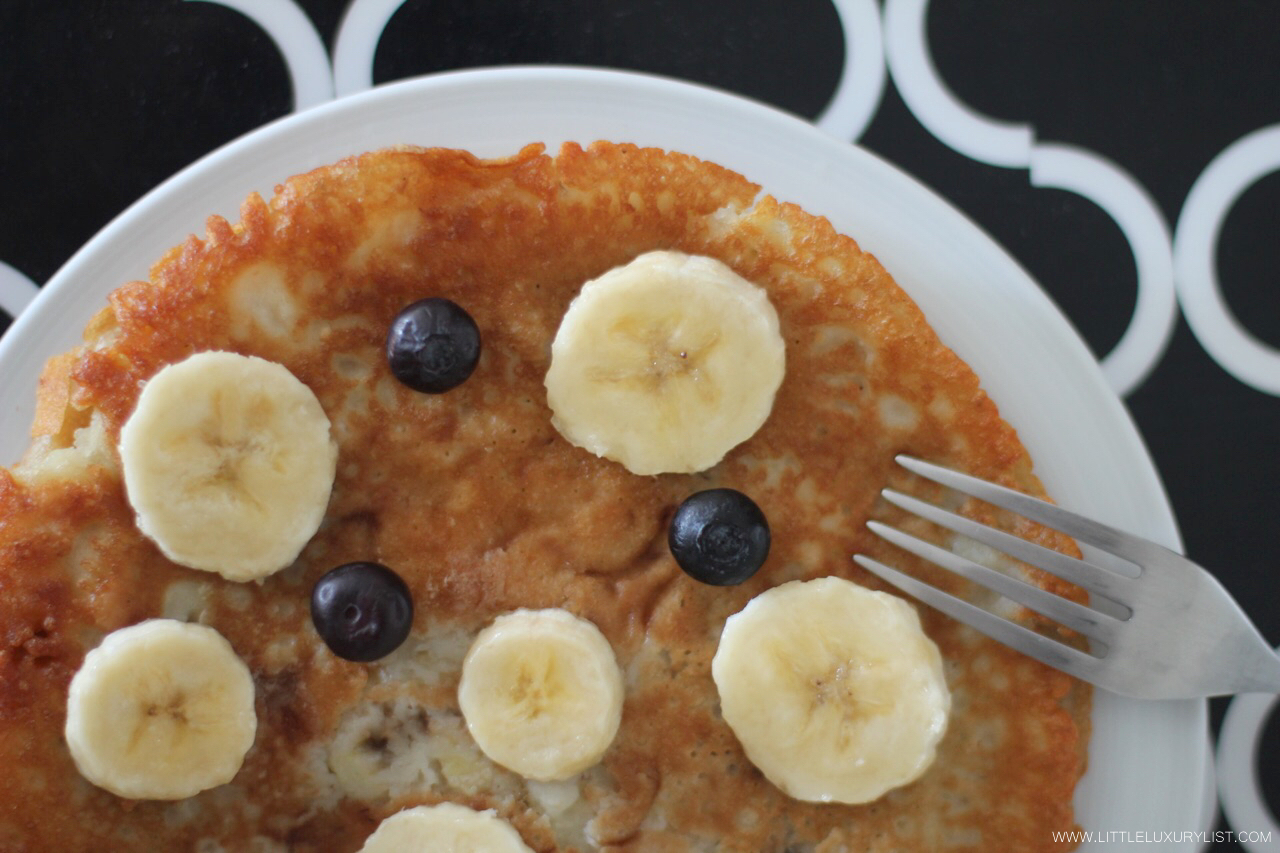 Sweet potato pancake with banana and blueberry top view by little luxury list.jpeg