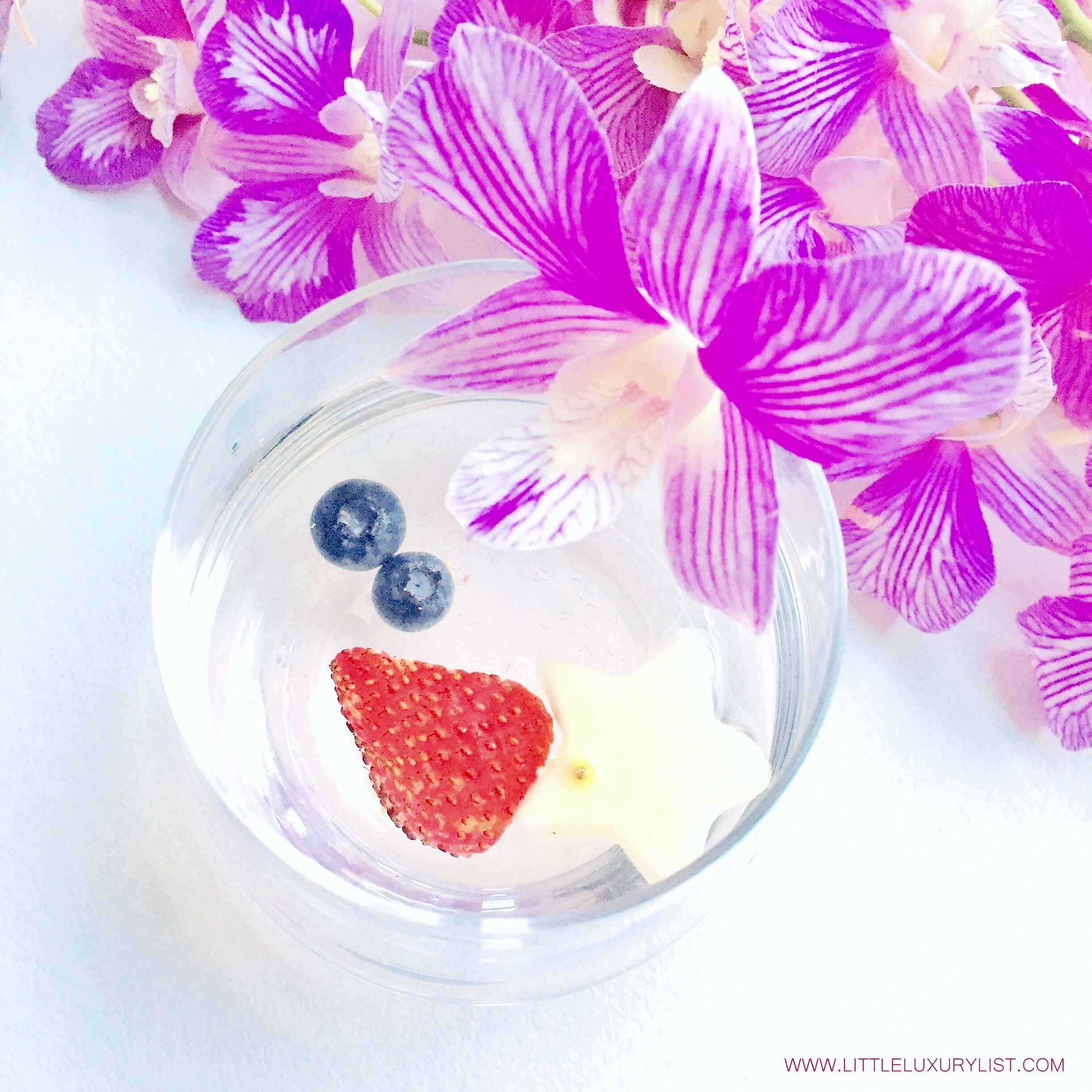 Red white and blue water aka Fourth of July Water with orchids on diagonal by little luxury list