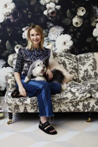 Rebecca Taylor's Chic New York Office Rebecca Taylor in front of Elie Cashman wallpaper