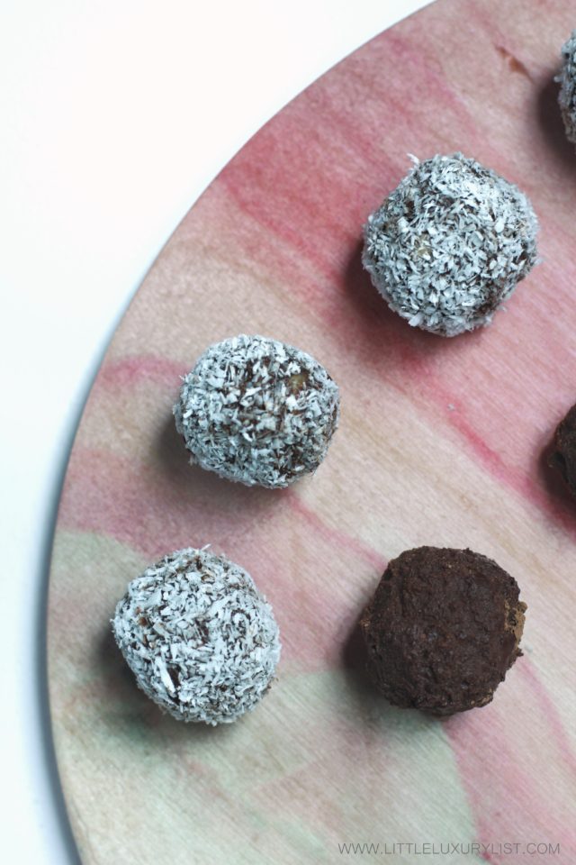 Healthy Chocolate Date Truffles top view pink board