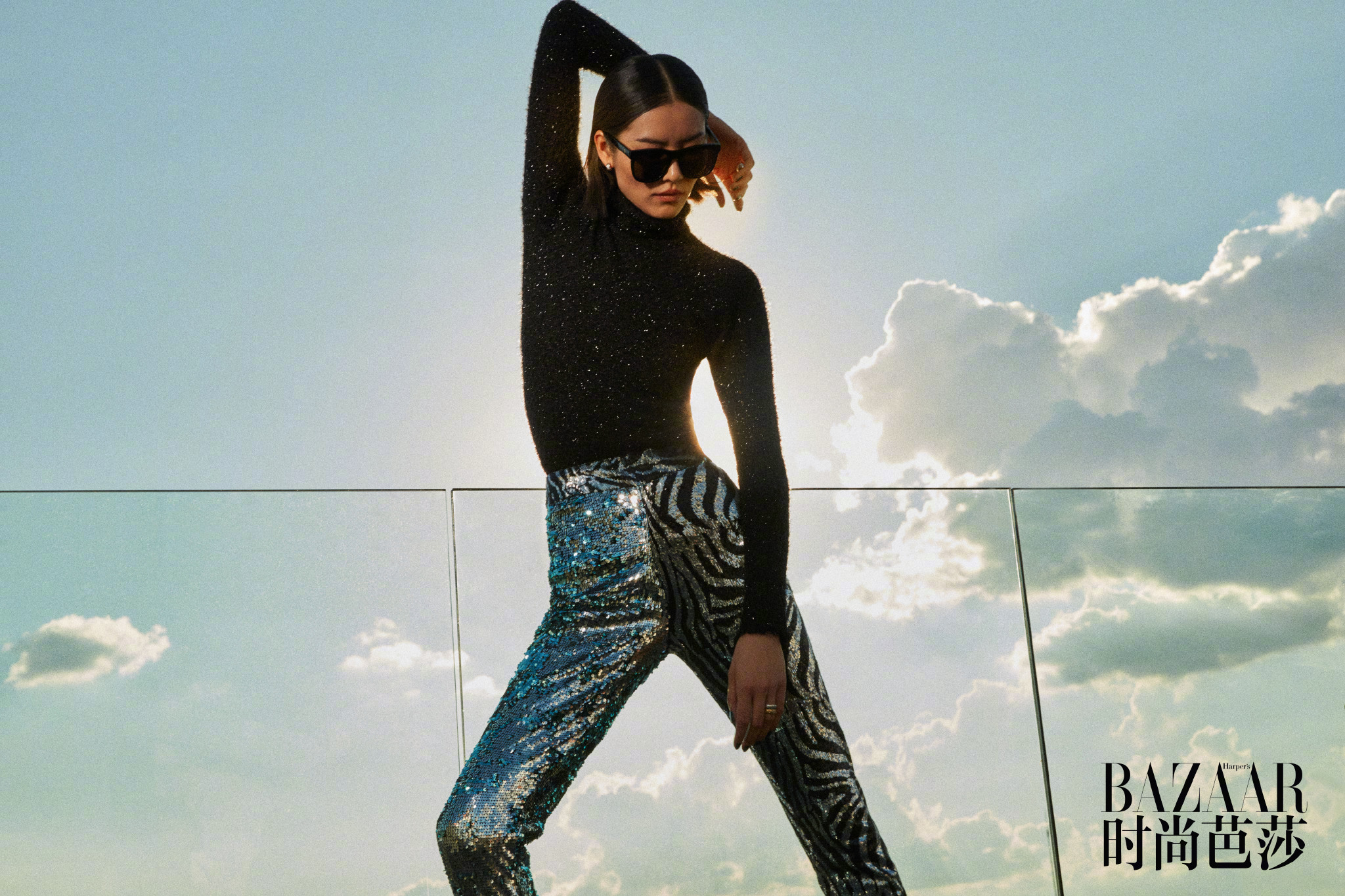 Liu Wen for Harper's Bazaar China August 2018 - sky view and zebra pants
